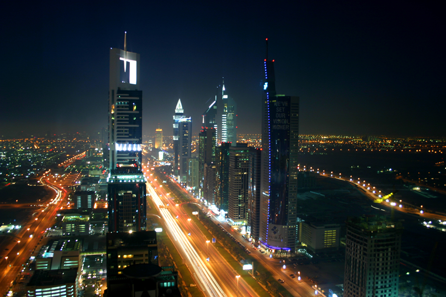 Dubai skyline at night along Sheikh Zayed Road